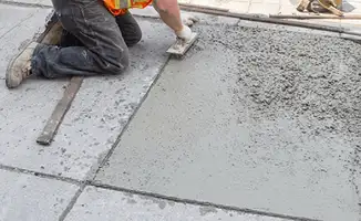 Professional repairing a concrete floor in Los Angeles, CA