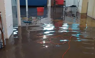 Basement with boiler, cabinets and washing machine completely flooded in Los Angeles, CA