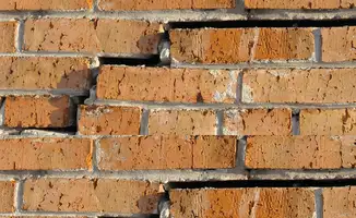 Brick wall with serious structural damage in Los Angeles, CA